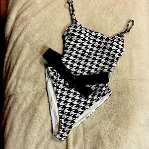 One piece belted swimsuit